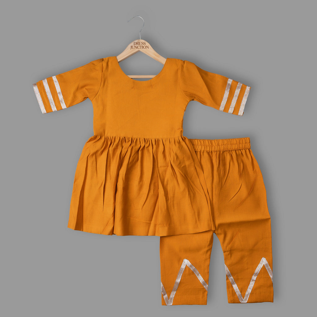 Girls Mustard Cotton-Viscose Kurti & Pant Set with Silver Tape Work