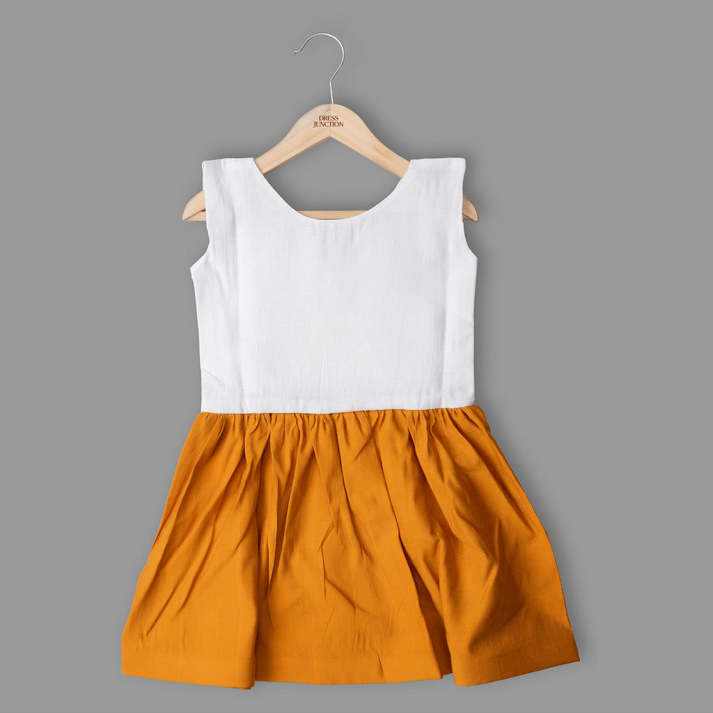 Girls White & Mustard Sleeveless Frock – Soft Shiny Cotton Blend