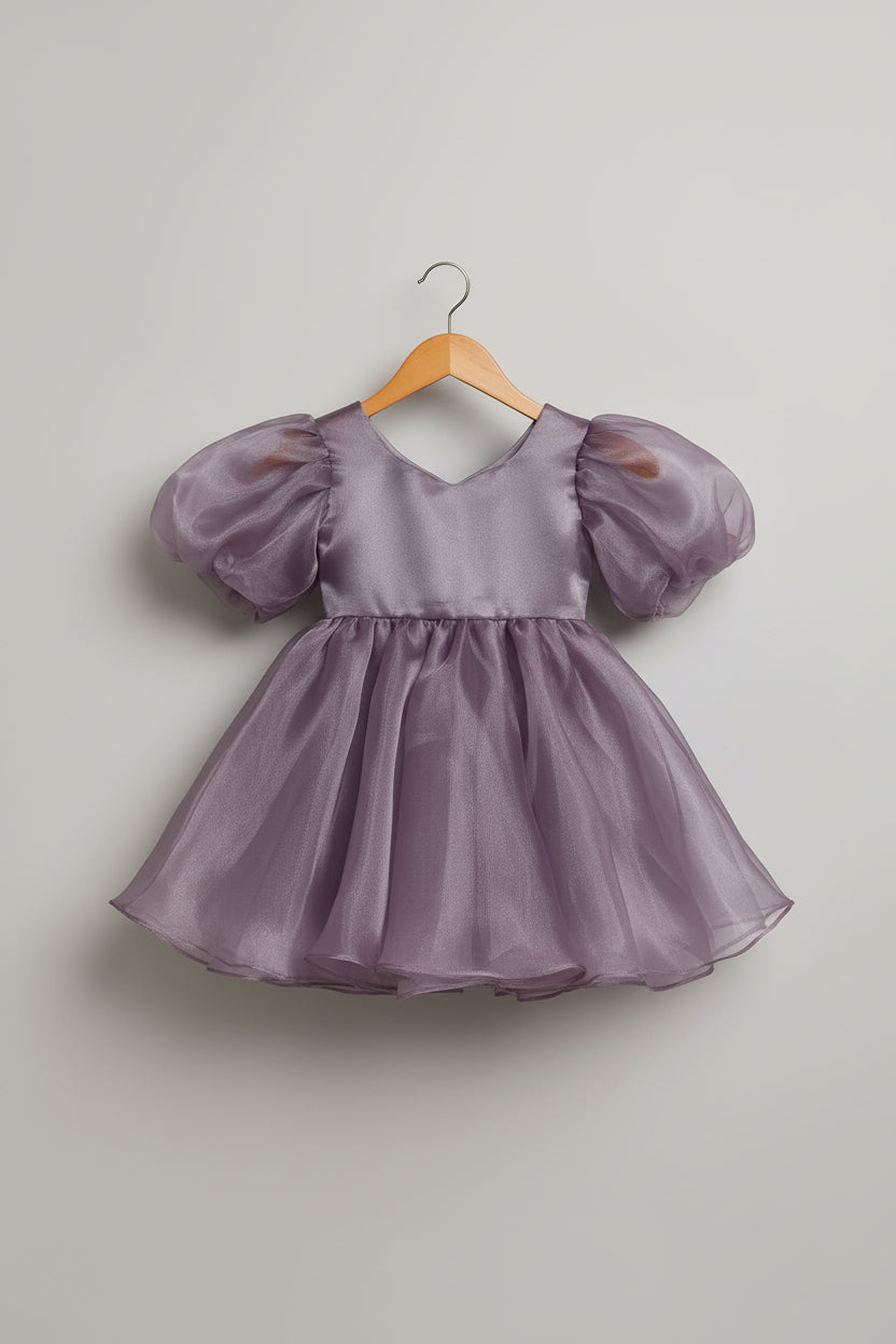 Purple dress with puff sleeves  on hanger