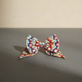 Girls red multicolour geometric print cotton blend hair bow with pointed tails